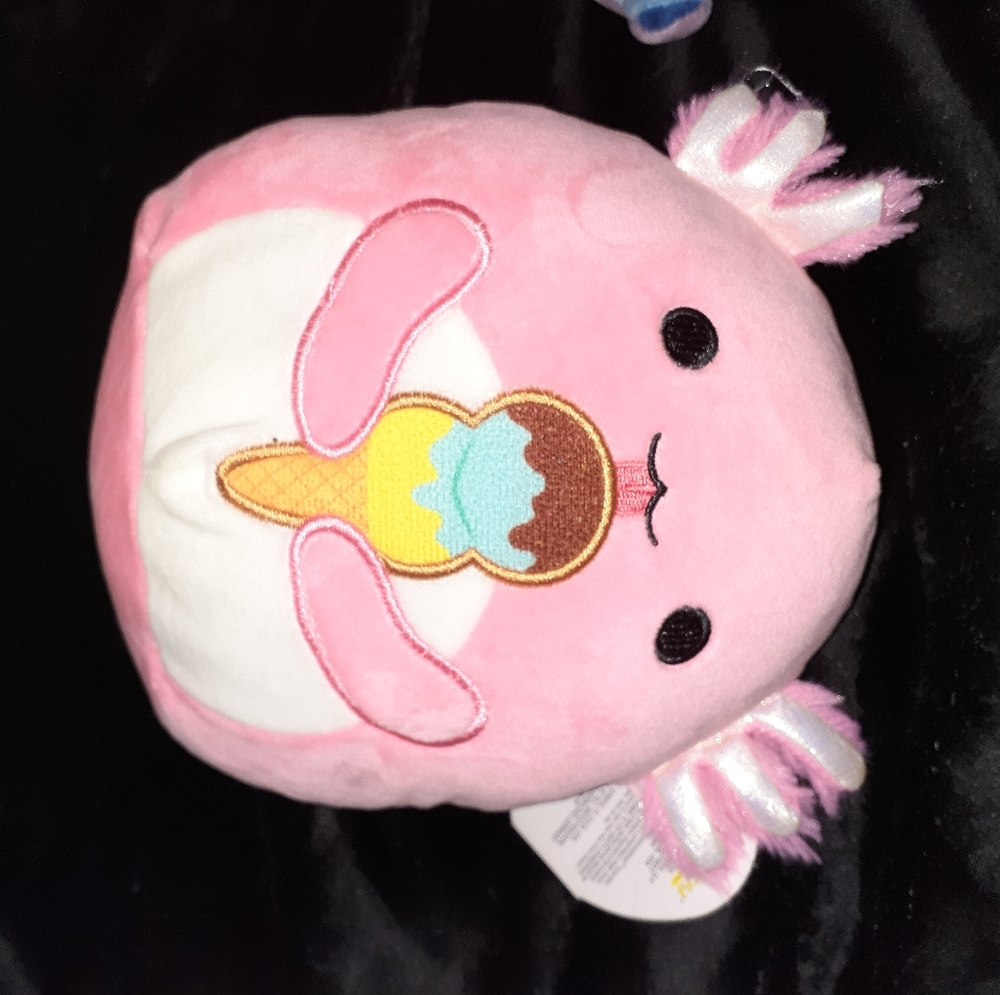 Squishmallow pink axolotl named archie